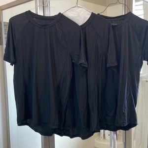 3 mens Lululemon black stretchy fitted shirts.